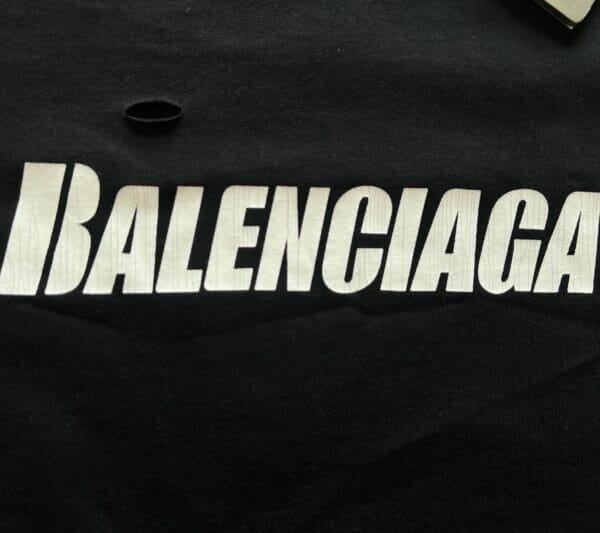 BALENCIAGA Ripped Oversized Logo-print T-shirt