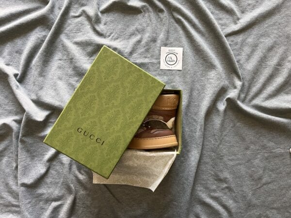 Gucci GG Sneaker Embossed Logo