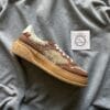 Gucci GG Sneaker Embossed Logo