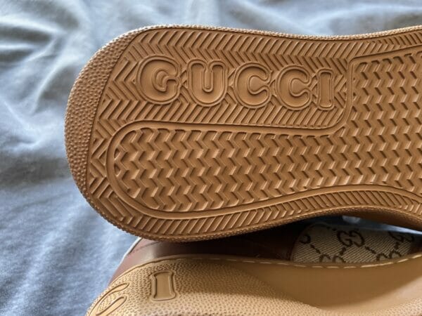 Gucci GG Sneaker Embossed Logo