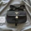 Prada triangle-logo messenger bag