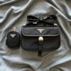 Prada triangle-logo messenger bag