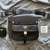 Prada triangle-logo messenger bag