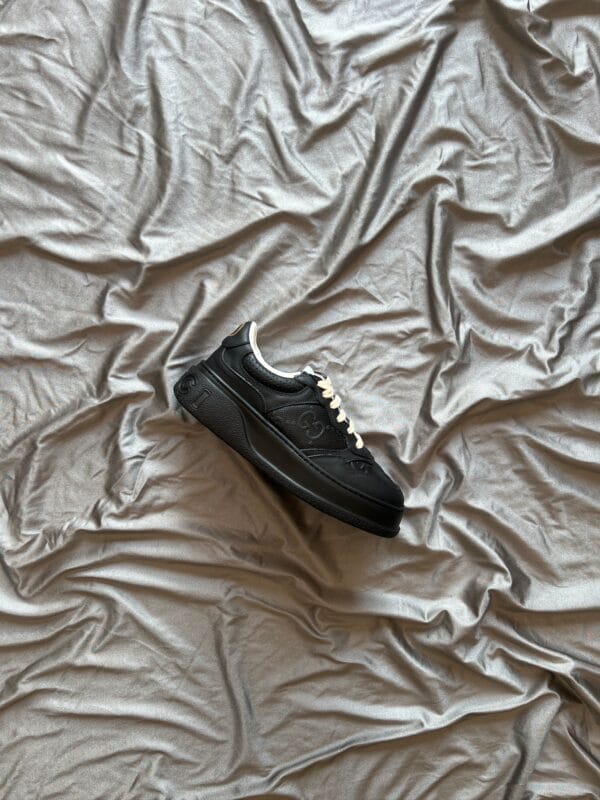 Gucci GG Sneaker Embossed Logo